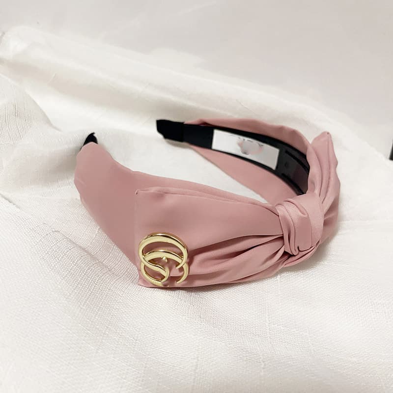 Bandeau en éponge rose à nœud haut, accessoire de cheveux simple et mignon, collection printemps/été 2026.