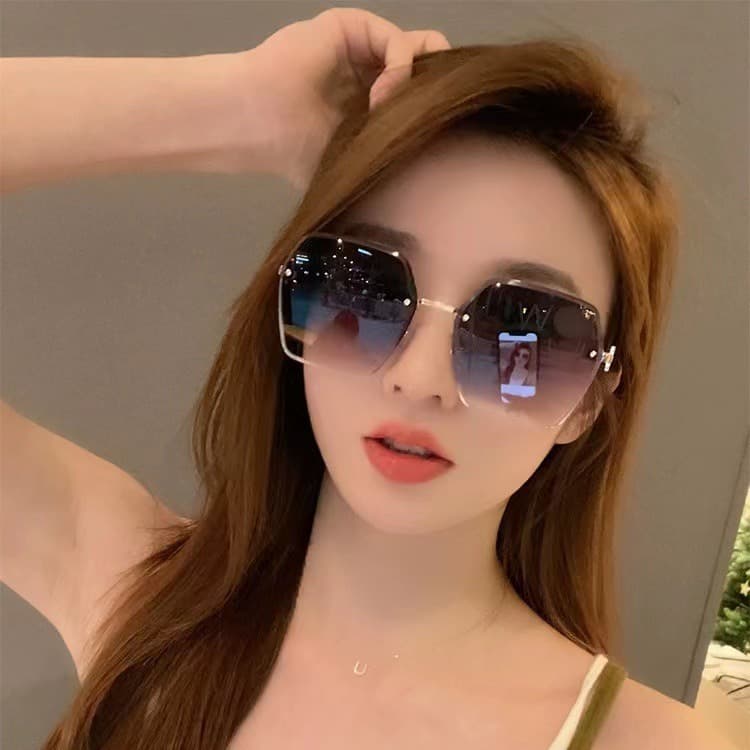 2025 New Fashion Women's Frameless Cut Edge UV Protection Internet Celebrity Sunglasses Manufacturer In Stock Supply Sun