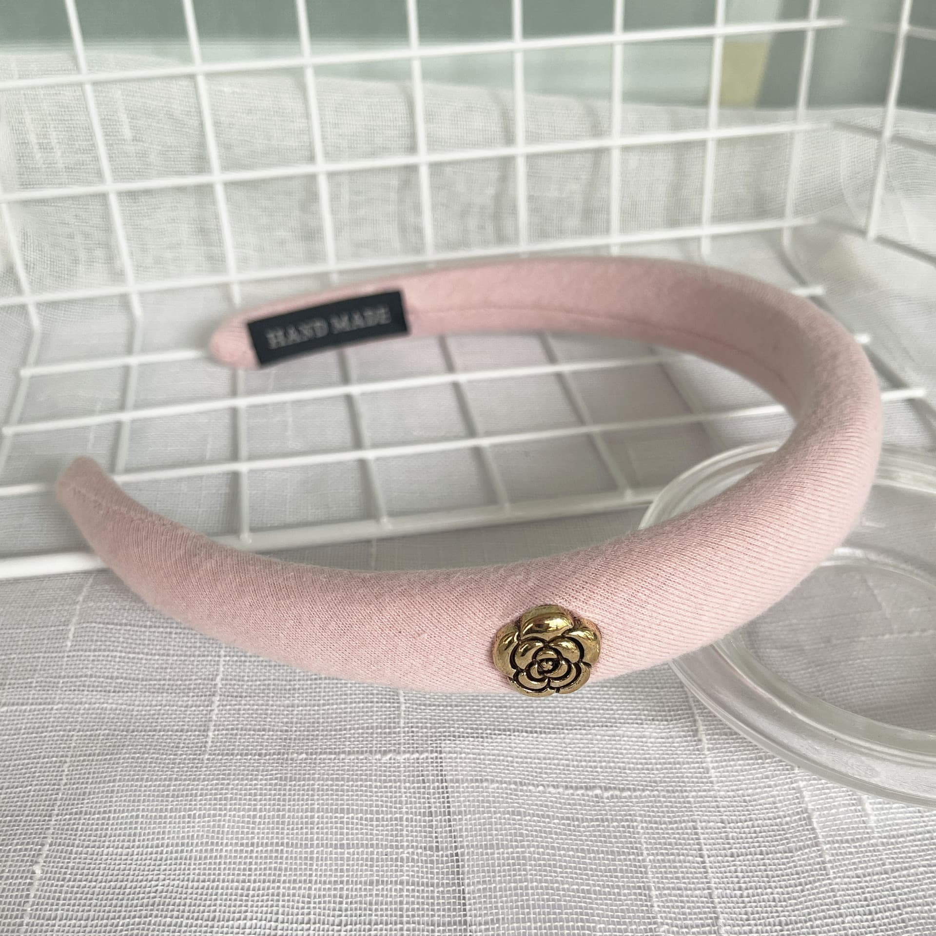 Bandeau en éponge rose à nœud haut, accessoire de cheveux simple et mignon, collection printemps/été 2026.