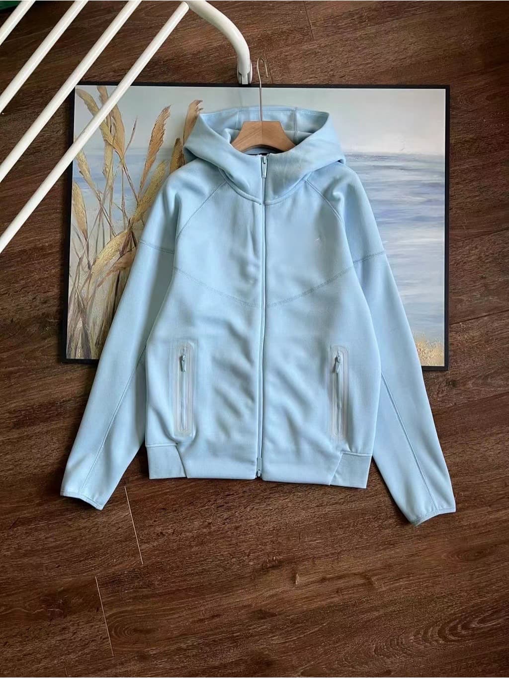 Veste de survêtement unisexe 2025, coupe-vent, à capuche zippée, style sport, avec petit crochet.