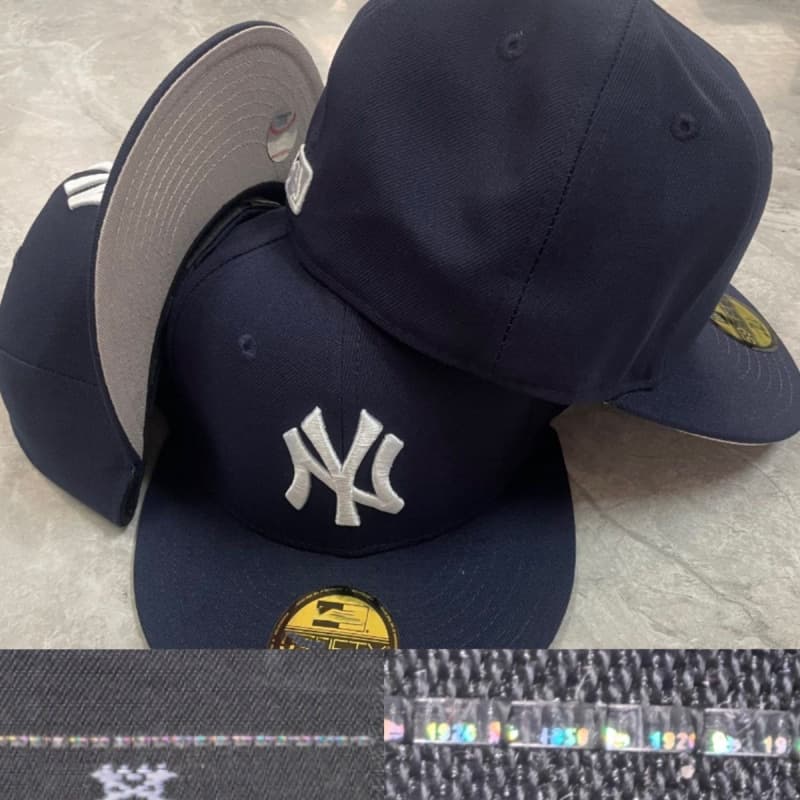 Casquette fermée de baseball brodée de haute qualité, style classique transfrontalier, de la Ligue sportive américaine, avec visière plate.