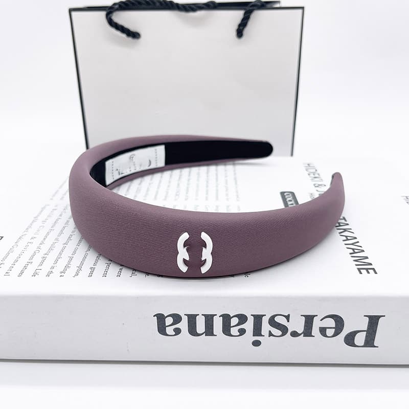 Bandeau en éponge rose à nœud haut, accessoire de cheveux simple et mignon, collection printemps/été 2026.