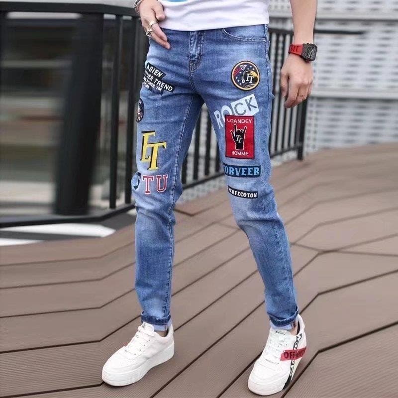 Jean à imprimé graffiti personnalisé de marque tendance pour hommes, style coréen, coupe slim extensible, long et polyvalent