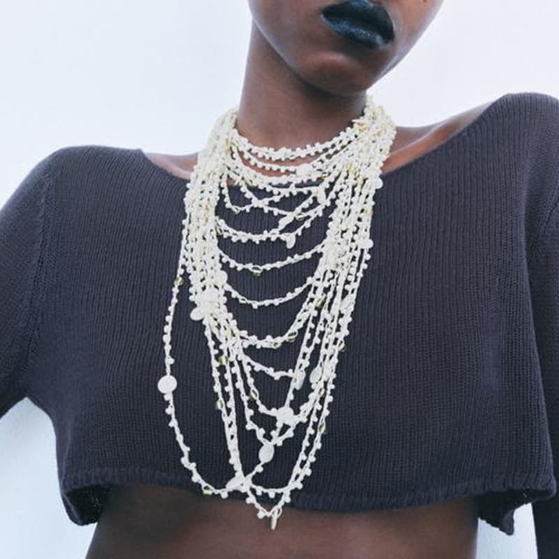 Fashion blogger same bead necklace Bohemian holiday style multi layer irregular shell necklace
