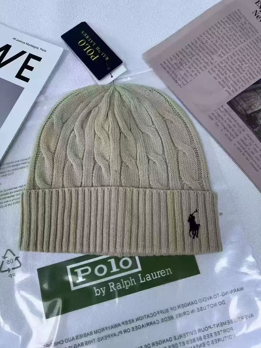 Polo gris en laine chaude brodée du logo Ralph Lauren (réf. 2025RL), idéal pour les couples par temps froid.