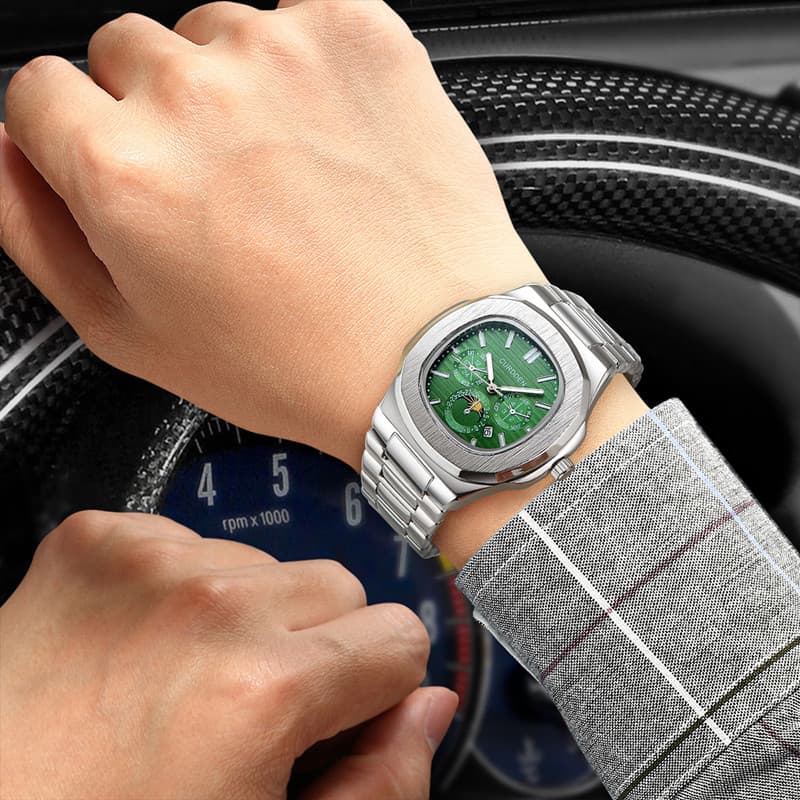 Montre homme décontractée à quartz avec bracelet en alliage, cadran rond, fonction date, style élégant et sobre.