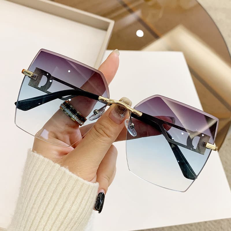 Women's trend rimless cut edge fashion driving travel glasses advanced feeling sunglasses