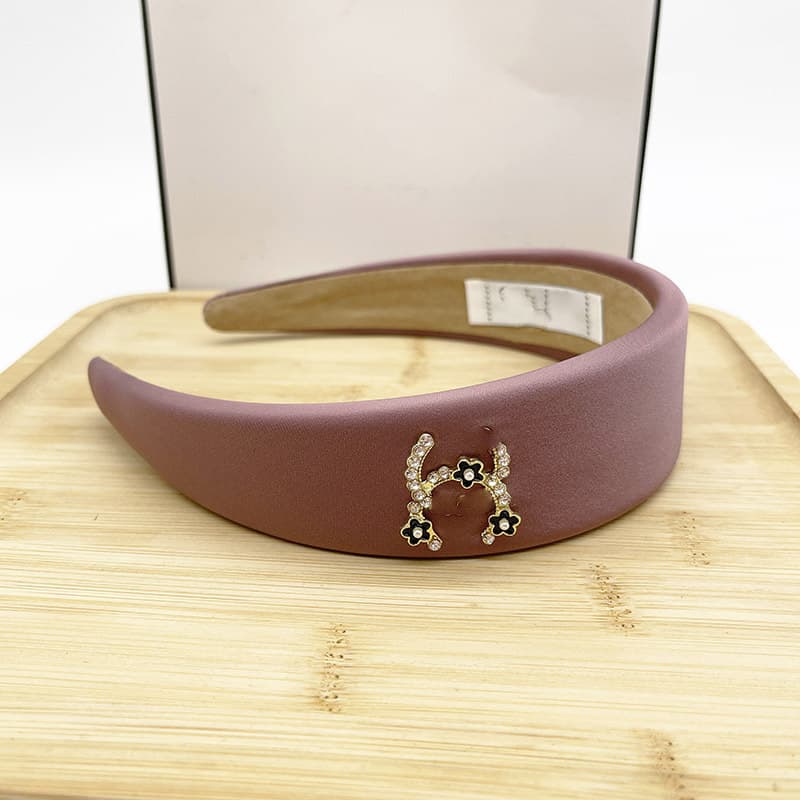 Bandeau en éponge rose à nœud haut, accessoire de cheveux simple et mignon, collection printemps/été 2026.
