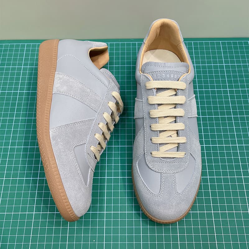 Chaussures d'entraînement Margiela Couple MM6, en cuir de vachette pleine fleur, résistantes à l'usure, antidérapantes et confortables. Baskets d