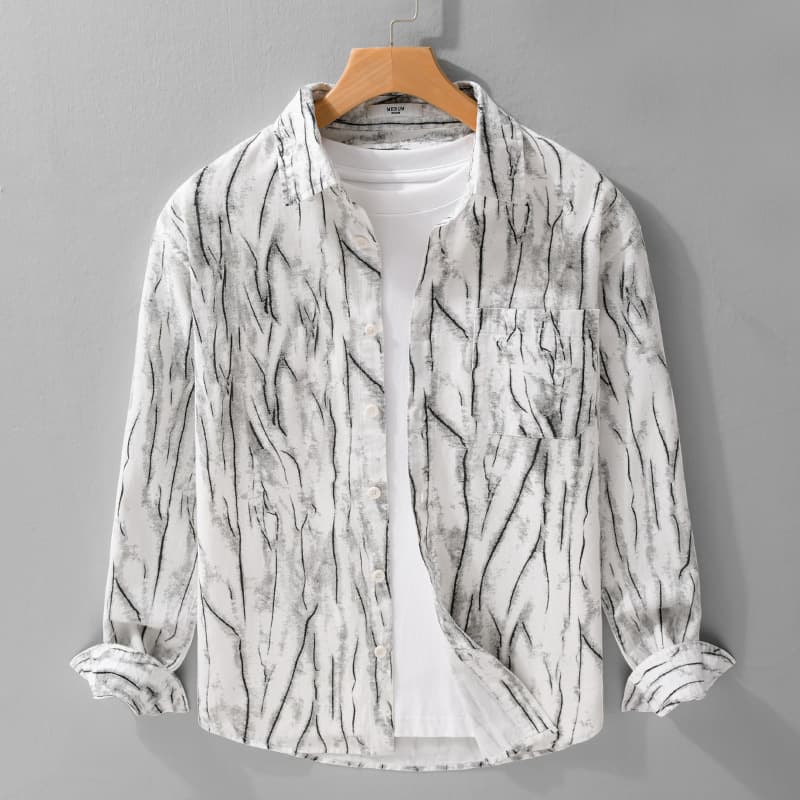 Chemise décontractée à manches longues et imprimé camouflage pour homme – 100 % coton, coupe décontractée, boutonnée pour un style urbain.