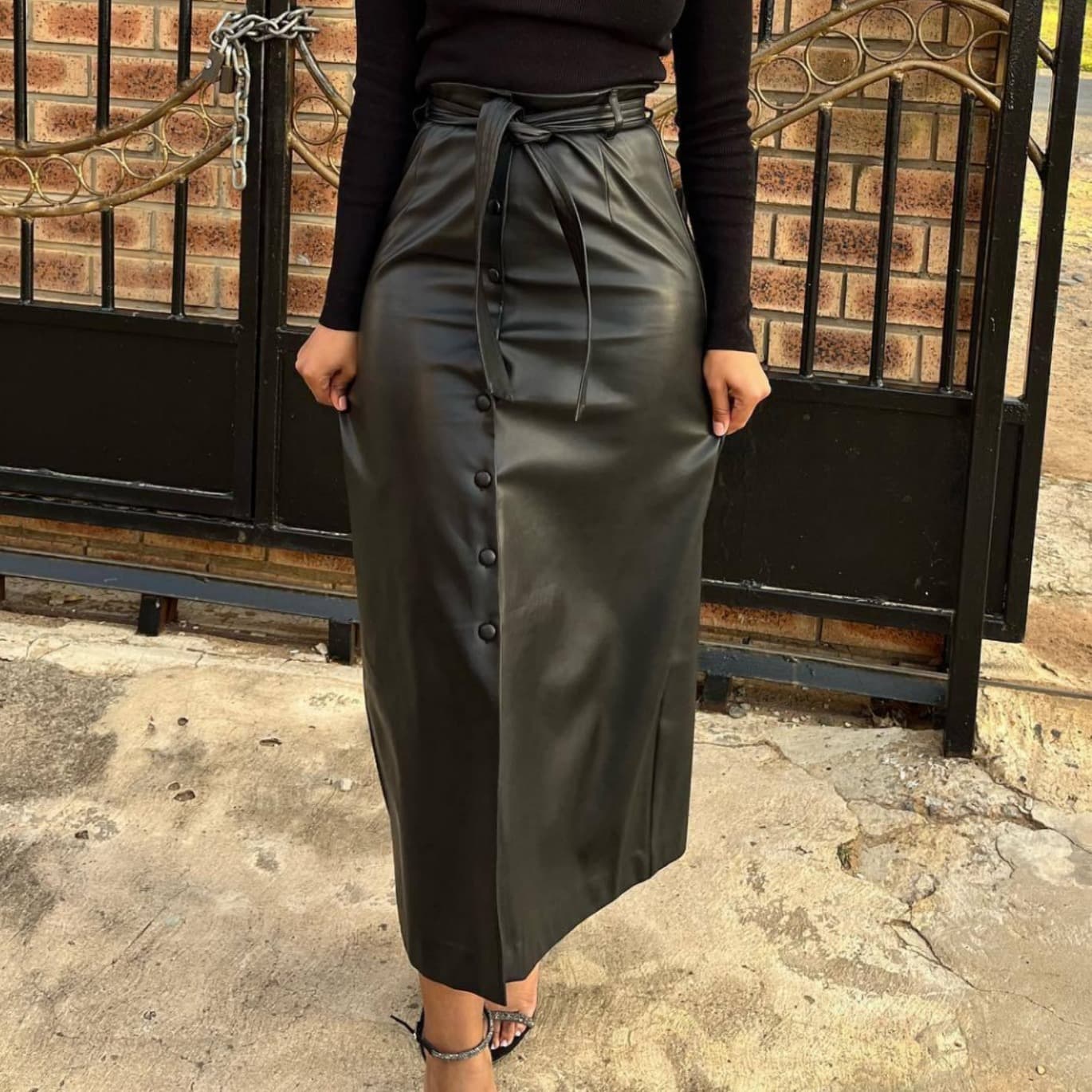 Women's Clothing women's autumn and winter mid length black PU buckle slit half length leather skirt with belt spot model