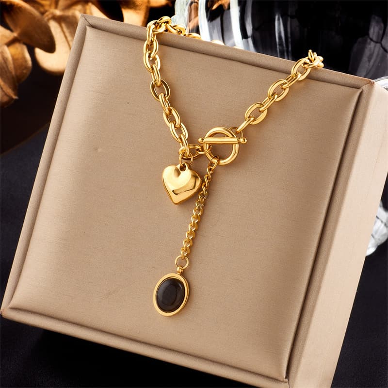 European and American metal thick chain titanium steel oval tassel pendant love OT buckle creative simple fashion heavy industry necklace