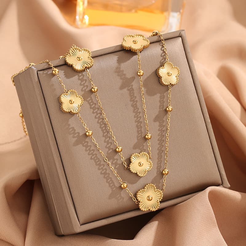 Double-sided five-leaf flower long sweater chain light luxury high sense versatile simple atmosphere titanium steel necklace