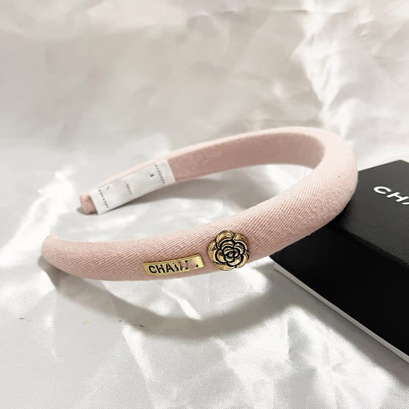 Bandeau en éponge rose à nœud haut, accessoire de cheveux simple et mignon, collection printemps/été 2026.