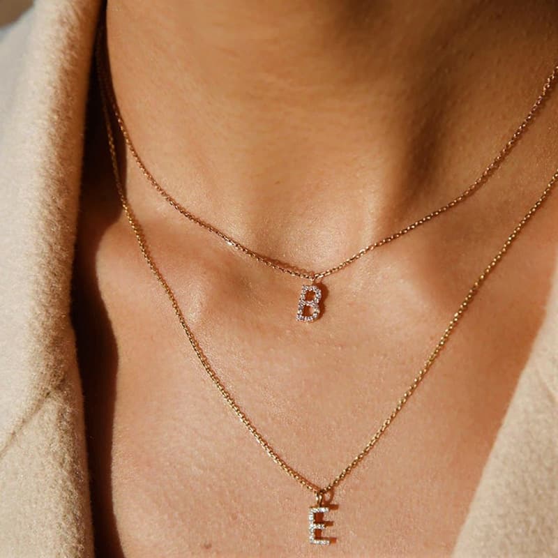 EManco minimalist stainless steel diamond studded letter pendant plated with 14K gold , collarbone chain, short