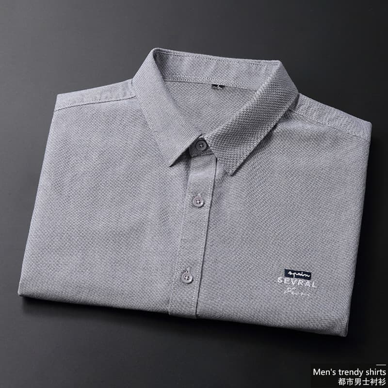 Chemise à manches longues printemps automne nouvelle version coréenne tendance en pur coton pour homme, décontractée et élégante.