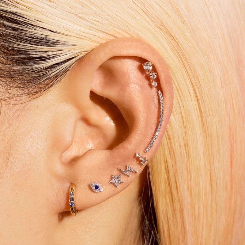 Unisex personality angel eye ear bone studs female geometric lightning screw buckle ear studs foreign trade piercing zircon earrings