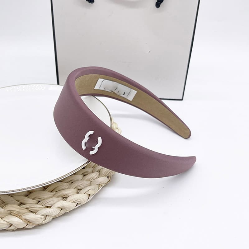Bandeau en éponge rose à nœud haut, accessoire de cheveux simple et mignon, collection printemps/été 2026.