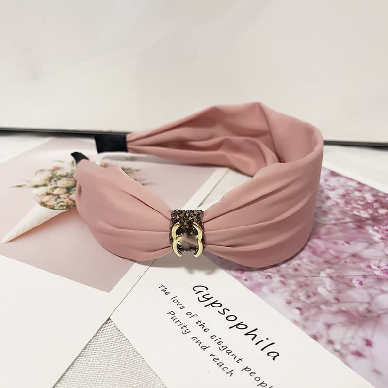 Bandeau en éponge rose à nœud haut, accessoire de cheveux simple et mignon, collection printemps/été 2026.