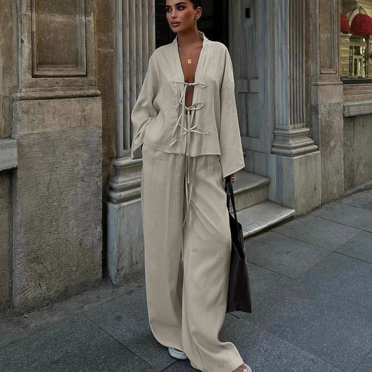 Ensemble deux pièces élégant de couleur unie pour femme : chemisier ceinturé et pantalon long