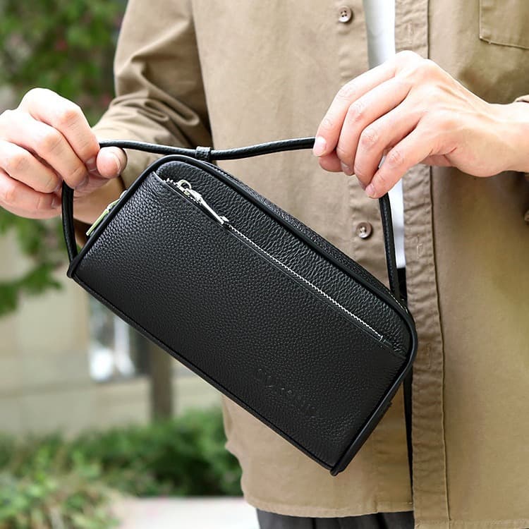 Sacs pour hommes, nouvelle trousse de maquillage pour hommes, pochette en cuir de vachette première couche, sac à main grande capacité, sac d'affaires à double tirette pour hommes