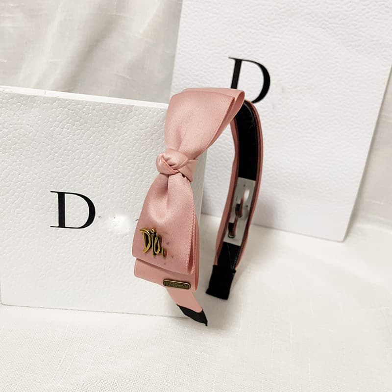 Bandeau en éponge rose à nœud haut, accessoire de cheveux simple et mignon, collection printemps/été 2026.