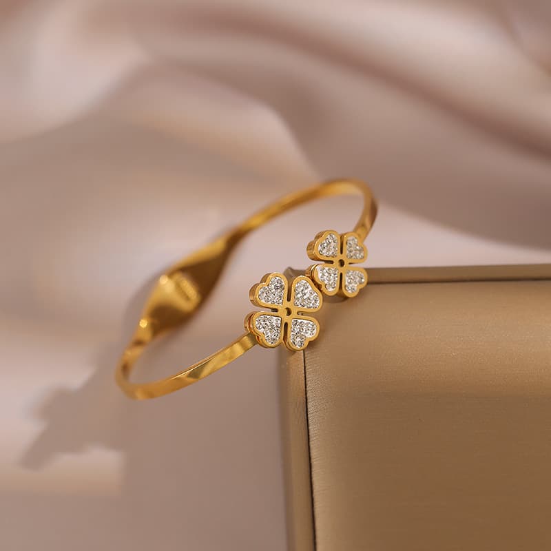 Women's Jewelry Fashionable Light Luxury Inlaid Zircon Gold Plated Bracelet Creative Four Leaf Clover Ladies Wear Bracelet Open Spring Jewelry