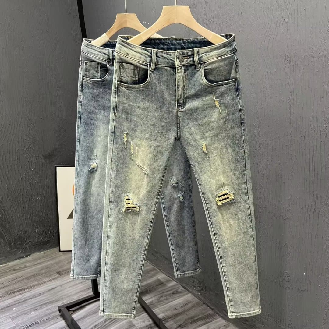 Personalized and versatile Korean version slim fit ruffled denim jeans for men's spring new trend distressed small leg