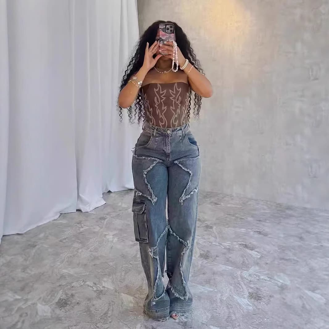 ​​"Edgy Patchwork Jeans With Star Embellishments & Frayed Hem – Vintage Blue Loose Straight Leg Denim For Streetwear"​​
