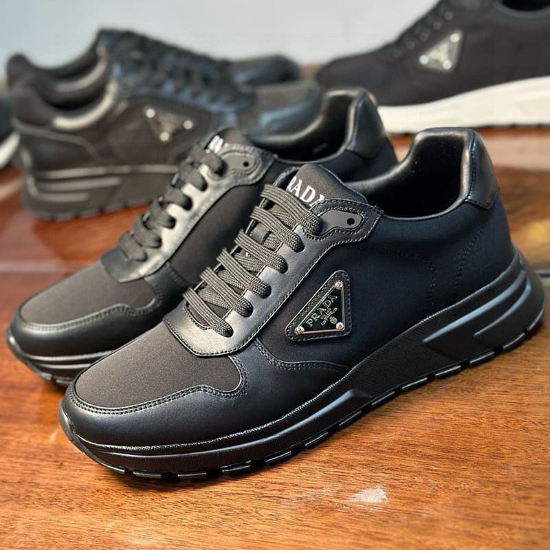 Baskets de sport haut de gamme pour hommes, chaussures de course décontractées à logo triangulaire, en cuir véritable, patchwork, maille, semelle