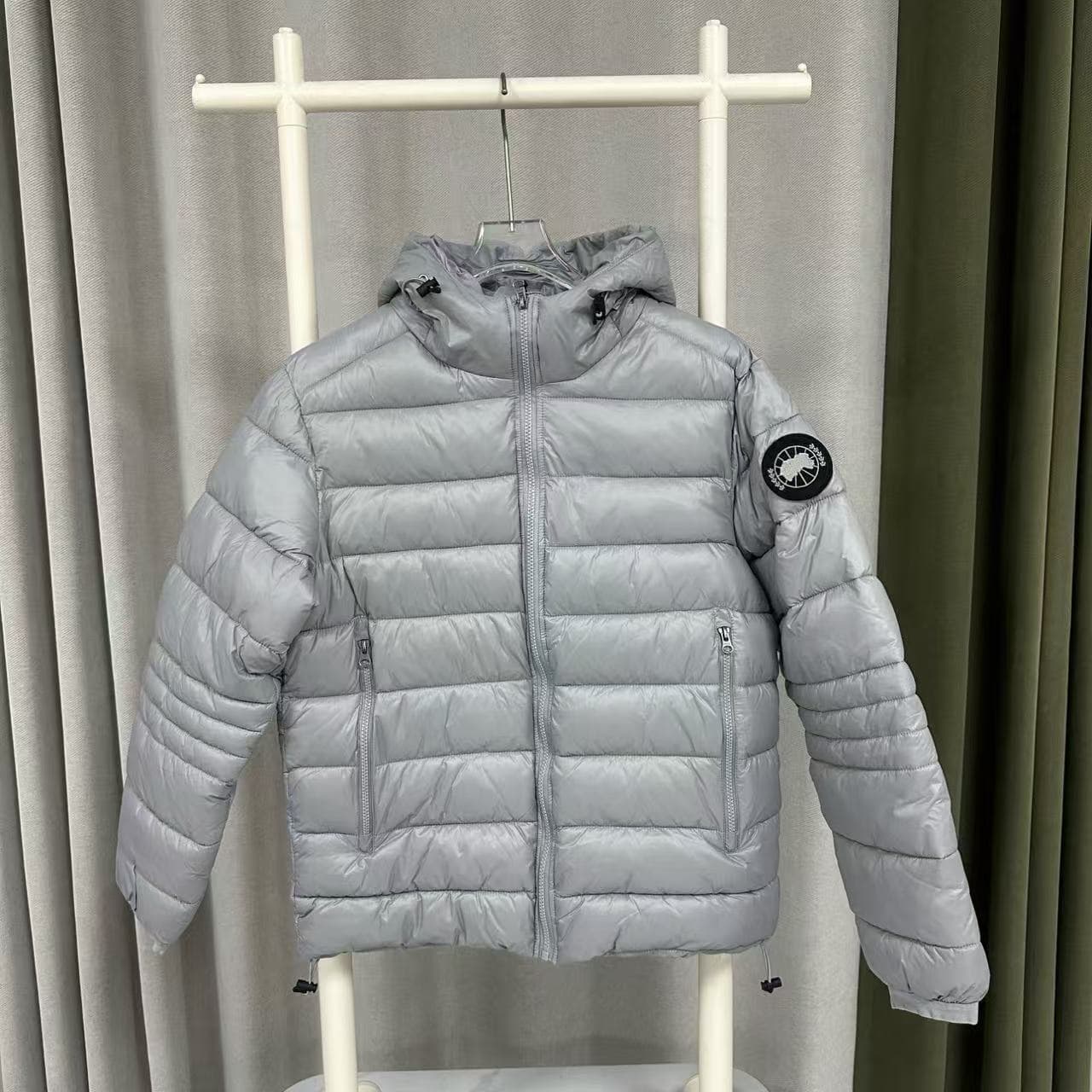 Veste unisexe en coton à capuche avec logo et couleur unie
