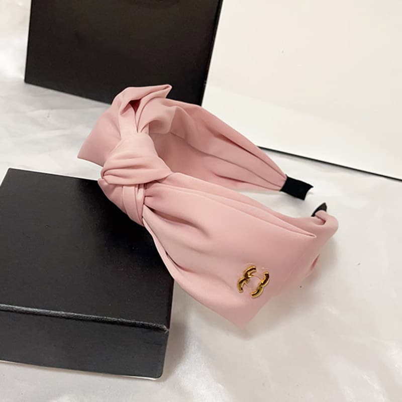 Bandeau en éponge rose à nœud haut, accessoire de cheveux simple et mignon, collection printemps/été 2026.