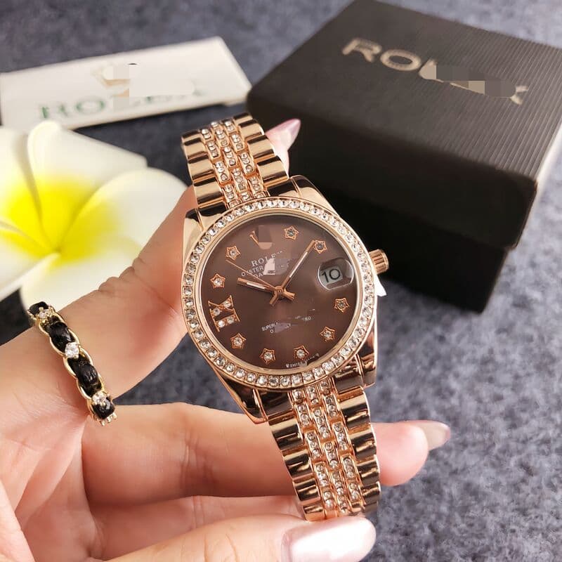 【Avec boîte】Montre femme style coréen business tendance, cadran rond orné de strass, bracelet en acier