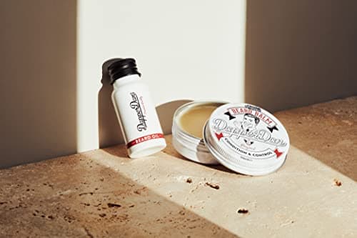 Baume Nourrissant pour Barbe Dapper Dan, Mélange d'Huiles Essentielles et de Cires pour Sculpter, Coiffer et Nourrir Moustaches et Barbe, Parfum de Vanille et Framboise, 1 x 50 ml