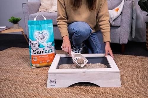 Sanicat Litière agglomérante parfum vanille et mandarine Composée de minéraux naturels avec contrôle des odeurs garanti Retient l’humidité et facilite le nettoyage Format 8L