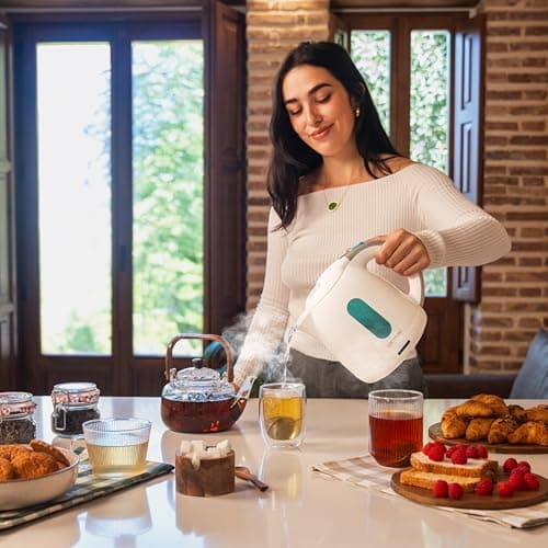 Cecotec Bouilloire électrique Thermosense 140 White. Bouilloire 1 L sans BPA, 2200 W, filtre anti-calcaire, base rotative 360o, sans fil et arrêt automatique pour un usage pratique et sûr.