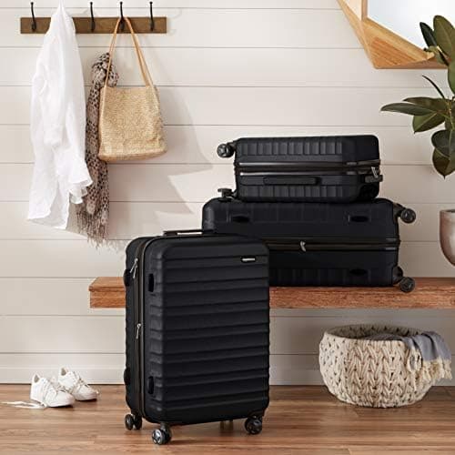 Amazon Basics Valise de voyage à roulettes pivotantes, Noir, 78 cm