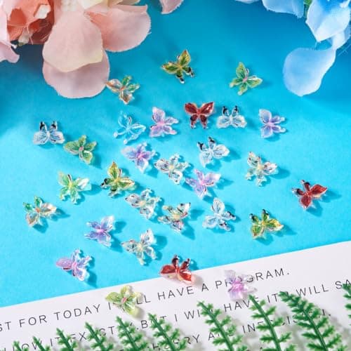 Cheriswelry Lot de 60 cabochons papillon à paillettes en résine transparente de couleurs mélangées pour décoration d'ongles, scrapbooking, pinces à cheveux, bricolage, bijoux artisanaux
