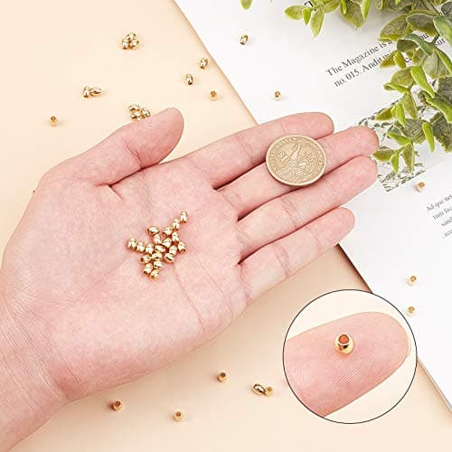 UNICRAFTALE 50 pièces Baril Perles en Vrac Perles en Métal Doré Perles en Acier Inoxydable 4mm Mini Bracelet Perles 2mm Trou Perles D'Espacement pour la Fabrication de Bijoux Résultats