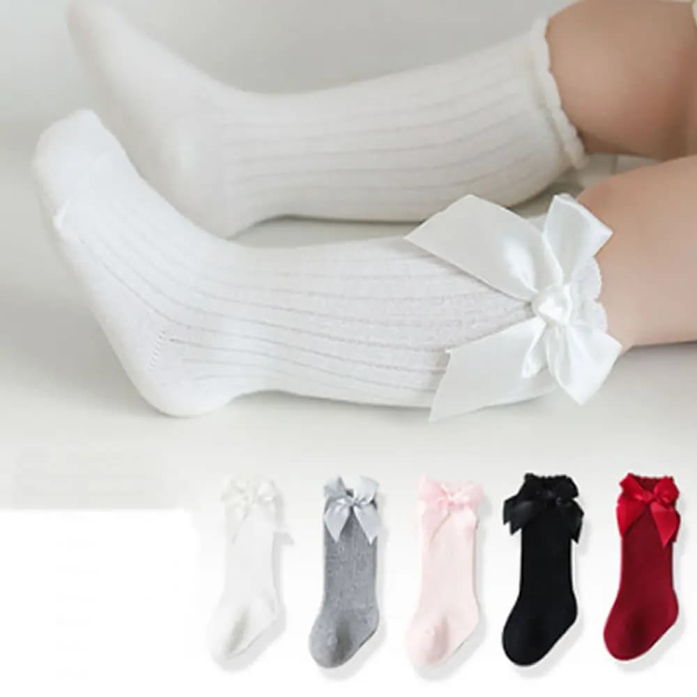 Bas à rayures de couleur unique pour filles, nouveaux bas à bouche bulle, nœud papillon, antidérapants en coton, bas en dentelle pour tout-petits