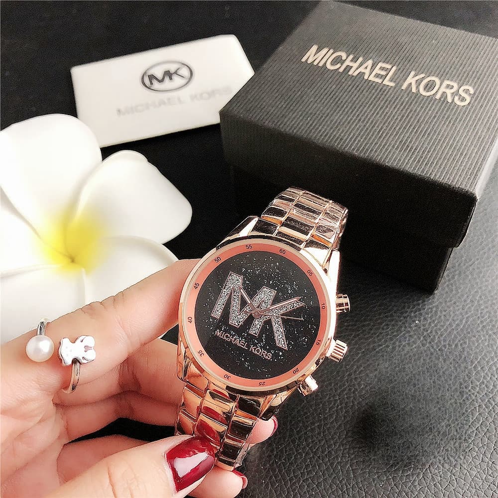 Classique Vente Chaude Femmes D'affaires Loisirs Montre À Quartz Simple Bande D'acier Plein Ciel Cadran Étoile