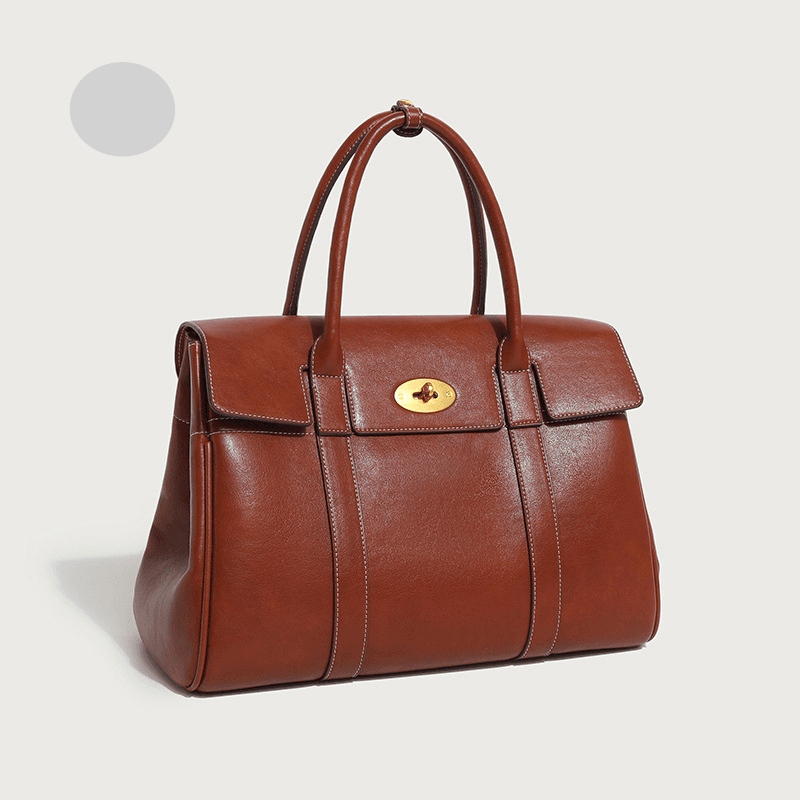 Sac à main pratique en cuir tanné végétal, collection 2024, style rétro texturé, bandoulière simple et grande capacité.