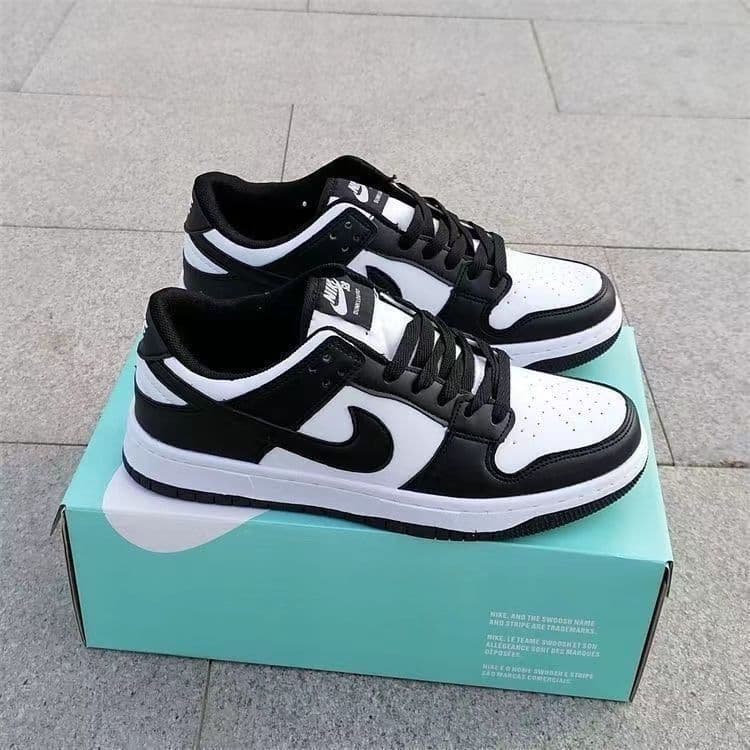 Chaussures de skate unisexes noires et blanches style campus, basses, tendance et polyvalentes, inspirées du panda et du campus.