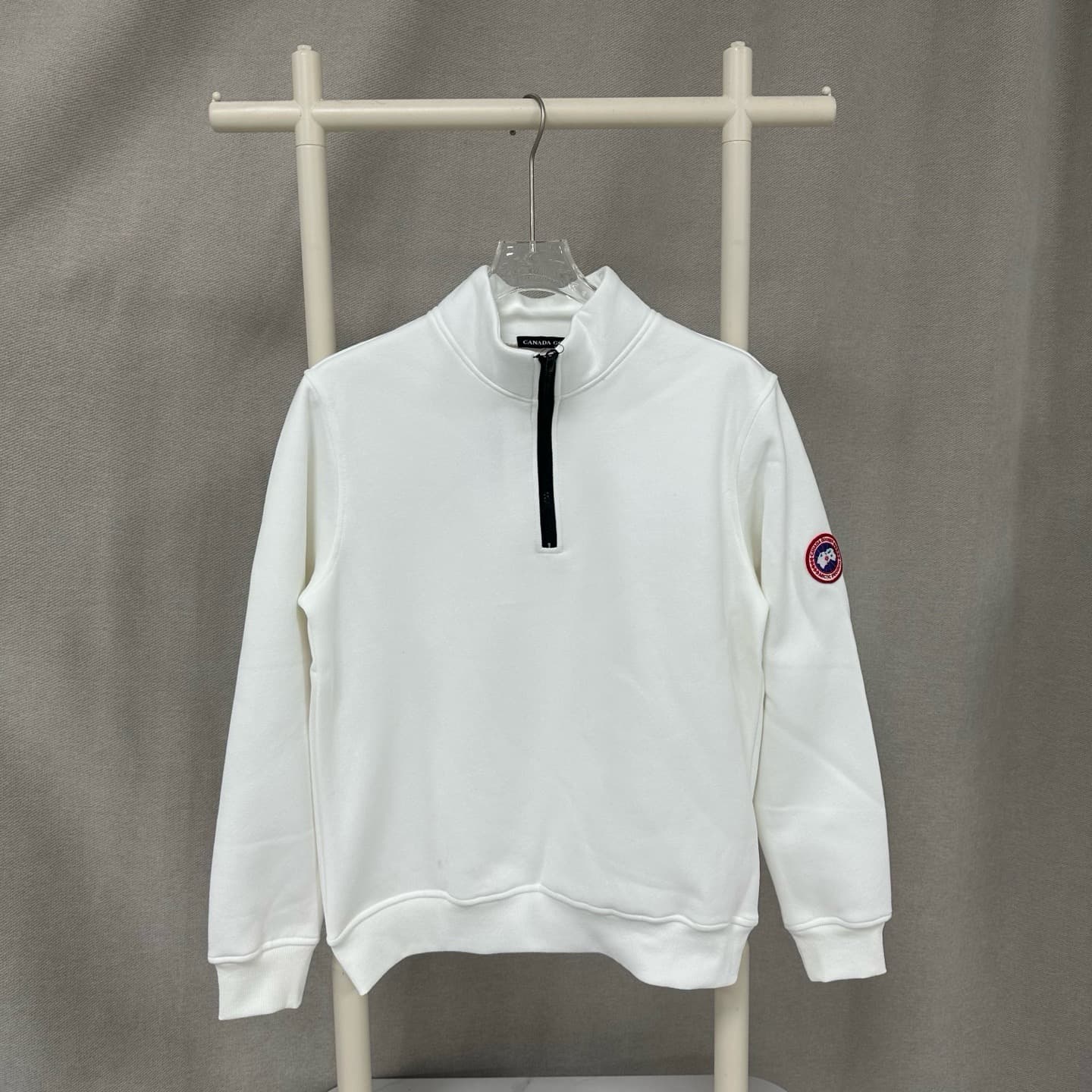 Pull polaire unisexe à manches longues et demi-zip couleur unie avec badge Canada 2025