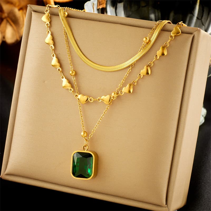 European and American fashion multi-layered mix and match stacked love snake bone chain emerald diamond cube pendant advanced versatile necklace