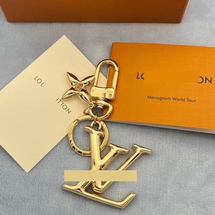 Porte-clés Donkey Brand Cross-Border pour femme, en métal doré, motif trèfle à quatre feuilles, accessoire de sac, pendentif lettre