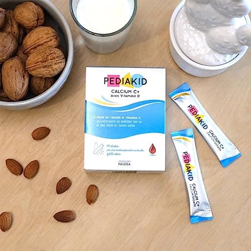 PEDIAKID Calcium C+ Enfant - Croissance Osseuse & Dents Solides 14 Sticks | Dès 3 ans, goût cola, vitamine D3, santé des os et des dents, poudre acidulée qui fond et pétille