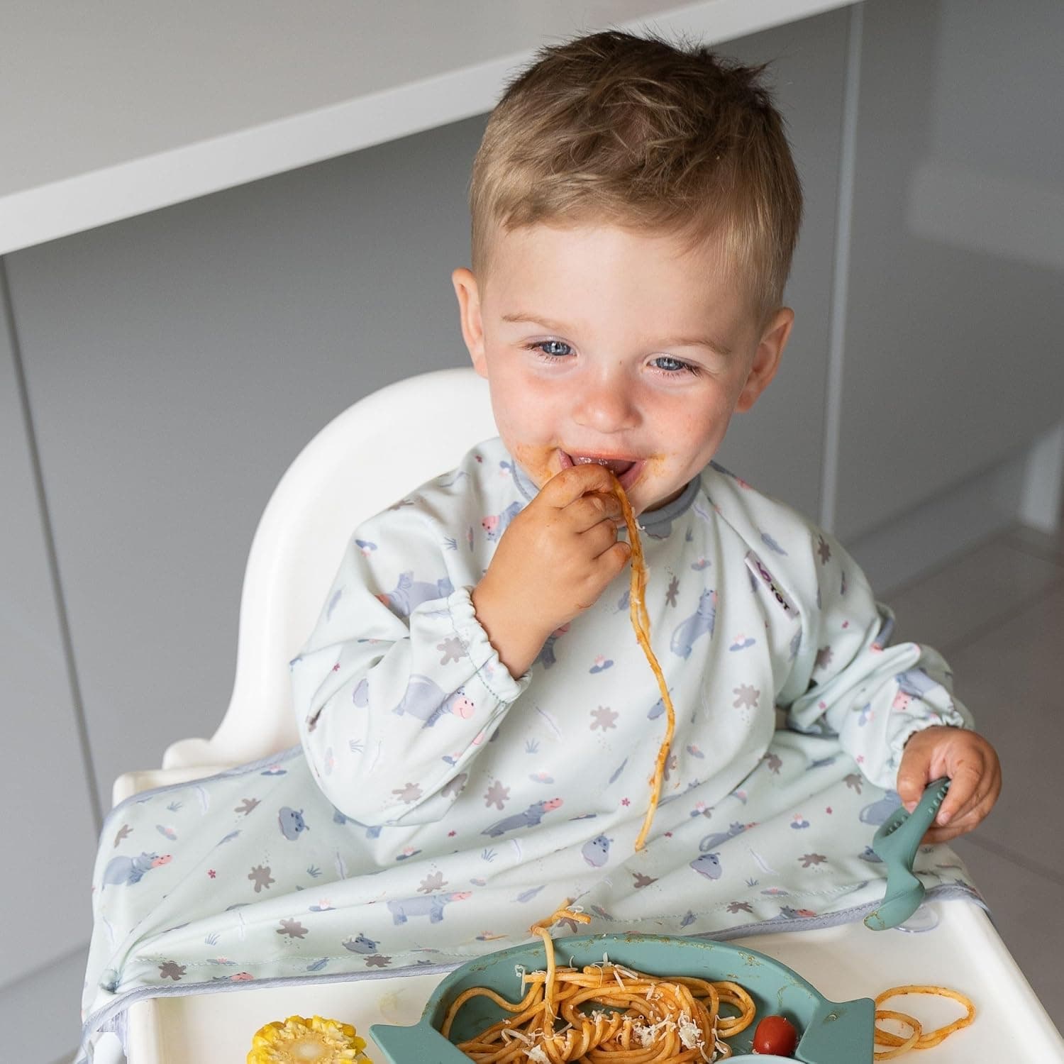 Tidy Tot®TM Cover & CatchTM Bavoir couvrant pour bébé. Bavoir d'alimentation avec manches. Se fixe sur les chaises hautes. Bavoirs à manches. Bavoirs DME pour chaise haute de nourrisson, bébé et enfant.